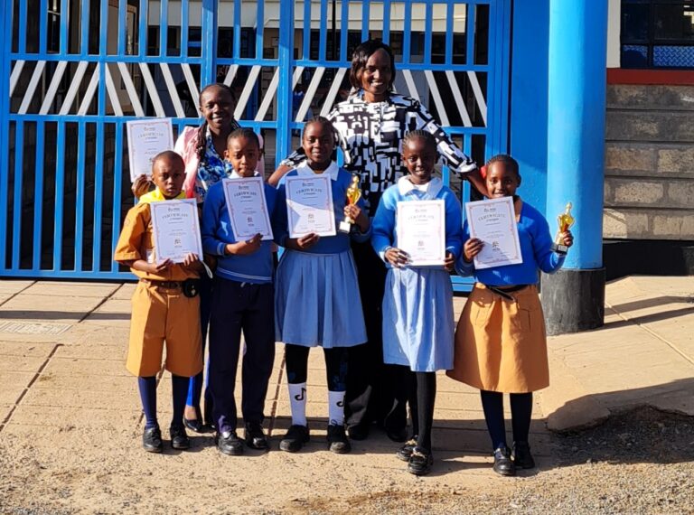 Mary Gatere with PCEA Nanyuki Academy Students