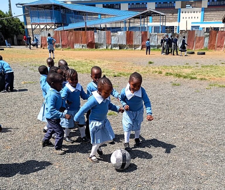 Scholarship Students playing soccer at PCEA Nanyuki Academy