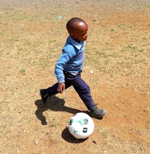Students playing soccer at PCEA Nanyuki Academy